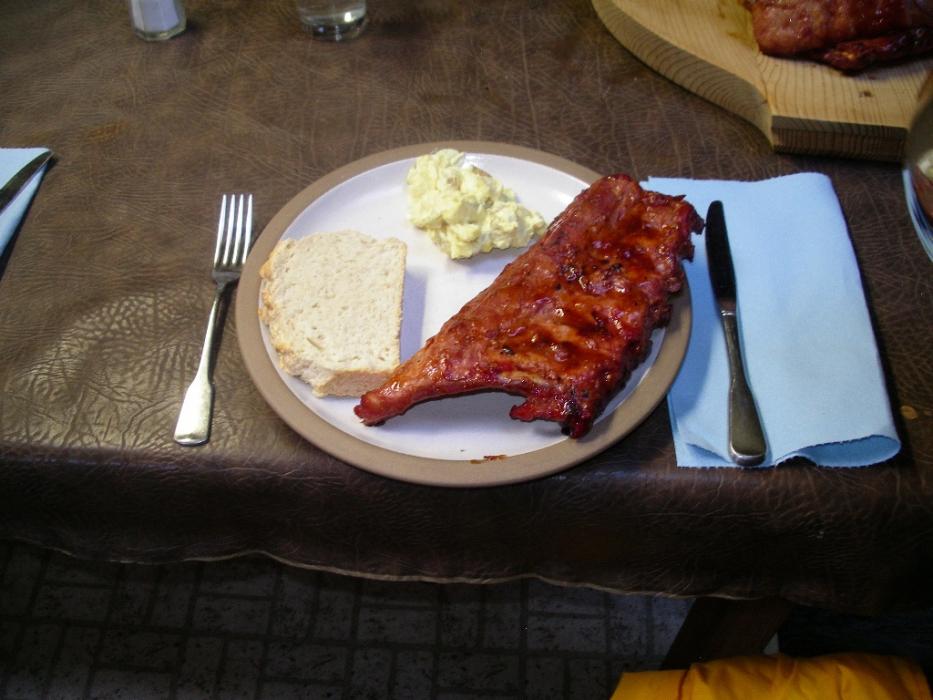 Barbecued ribs, potato salad and French bread for dinner. Photo by Don Quilici