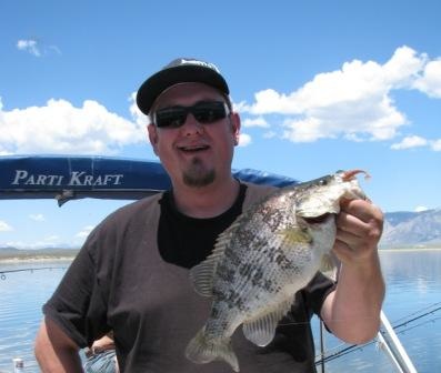 Jared Smith with a Sacramento Perch caught at Crowley Lake.