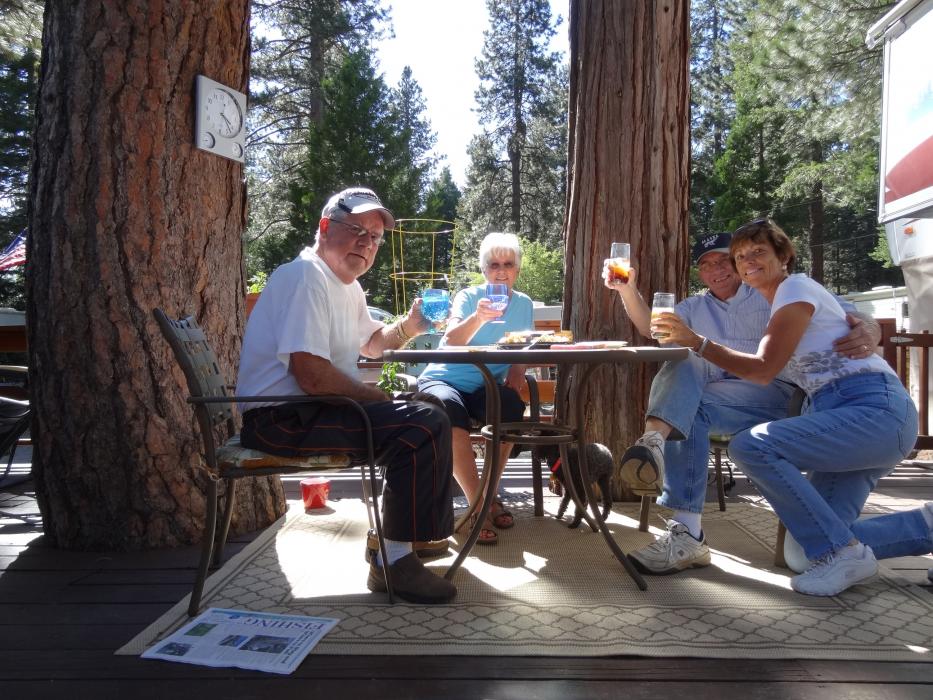 Four friends enjoying an afternoon cocktail. Photo courtesy of Elaine Quilici