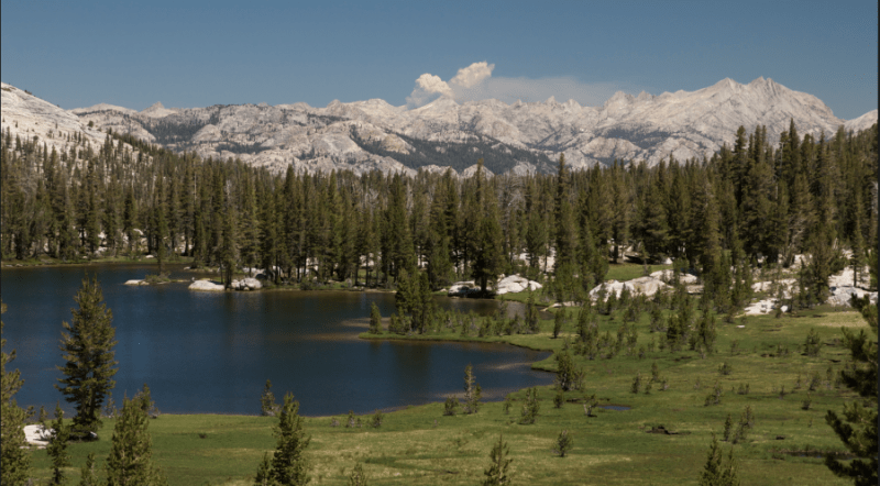 Upper Cathedral Lake with smoke from Bison Fire in background