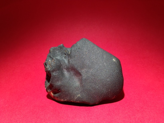 The main mass of the rare Sutter's Mill meteorite before the Smithsonian Institution cut it.