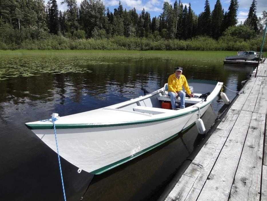 Don in one of the Lodge's fishing boats. Photo by Elaine Quilici