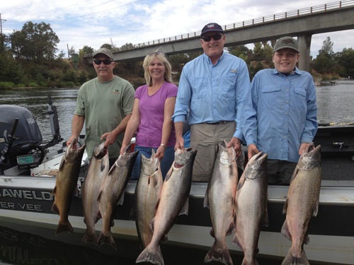 A group of happy anglers with their King Salmon caught in the Sacramento River.