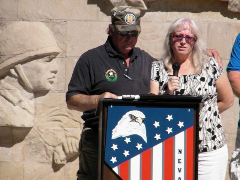 Bruce Betram and Doreen Portch lead the Pledge of Alliance.