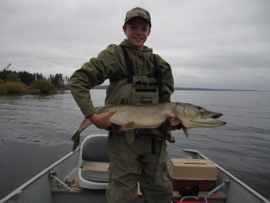 Dawson Fettic, age 14, of Carson City with a 20-pound, 44-inch Northern Pike caught in Canada. Photo by Mike Fettic