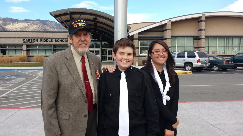Students with Korean War veteran Emory Crews.