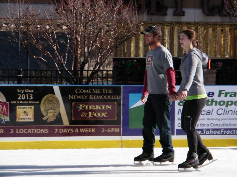 Christopher and Heather Poloway share a skate Friday in Carson City.