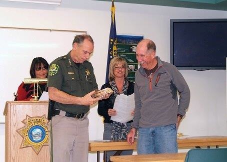 Reserve Commander Tom Crawford honored by Sheriff Furlong.