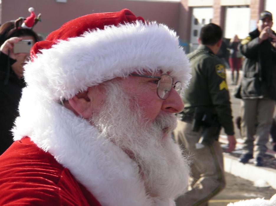 Santa arrives to dozens of screaming Carson City school children.