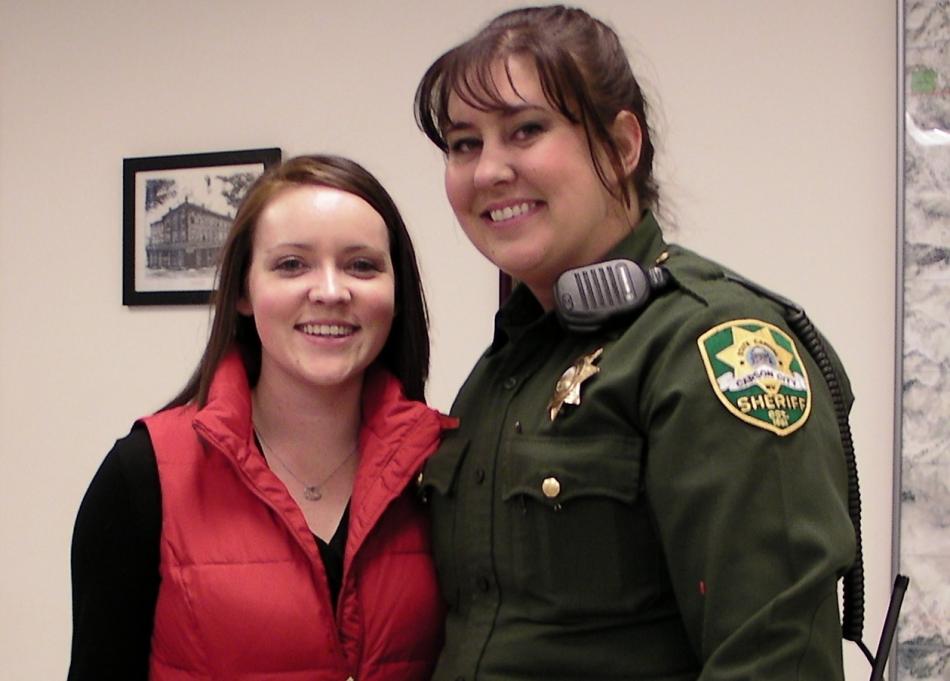 Santa's helpers Whitney Lambert and Reserve Deputy Evynne Fair.