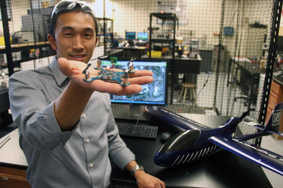 Kam Leang, mechanical engineering associate professor at UNR shows a prototype.