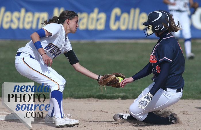 Mehan Hospodka makes the tag on Snow College's Renee Fagg at Edmonds Sports Complex in Carson City. Photo by Cathleen Allison