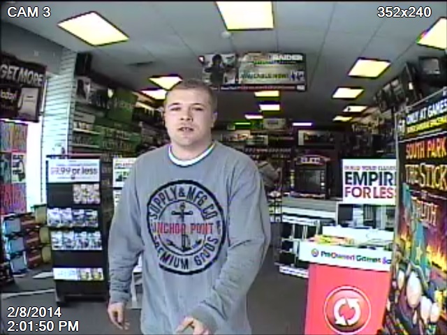 Surveillance of suspect seen entering the Topsy Lane store on Feb. 8.