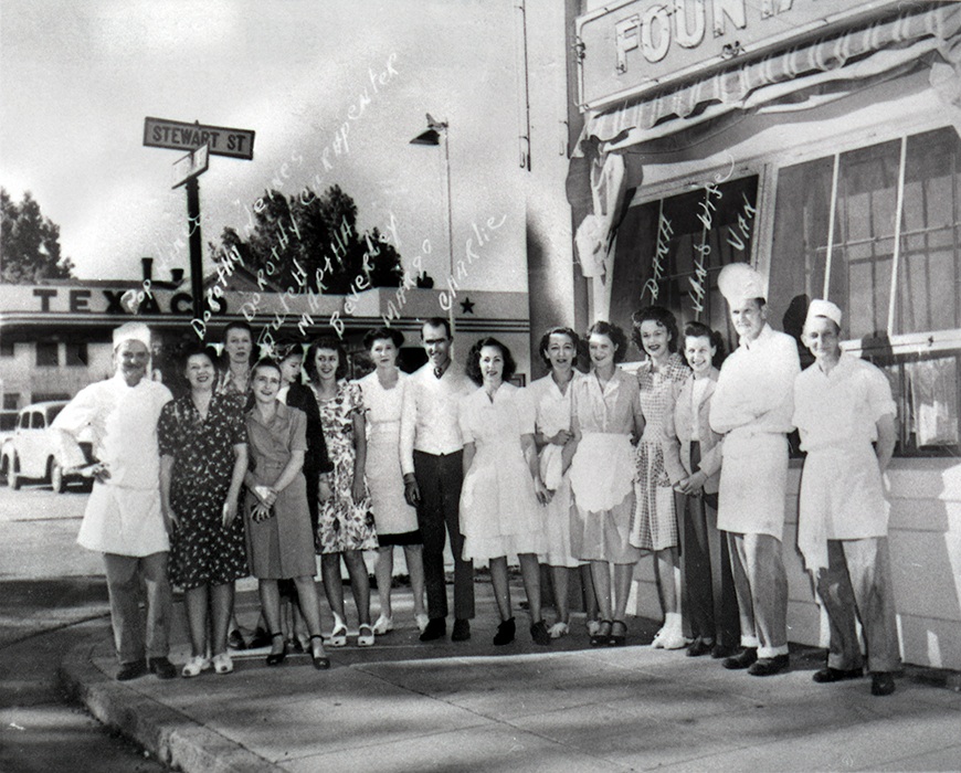 Staff members pose outside Harvey’s Q ne Q Restaurant at the corner of South Virginia and Stewart streets in Reno, circa 1945. 