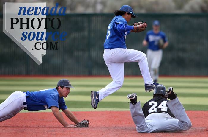 Shortstop Tony Roque dives after second-baseman Connor Klein came up with a line drive. Photo by Cathleen Allison