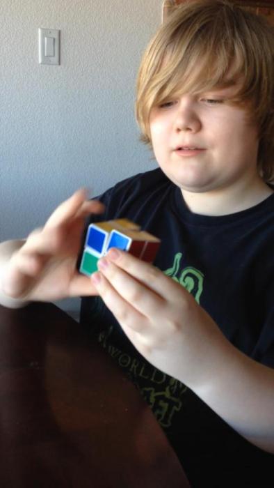 Ben Masters practices a Rubik's
