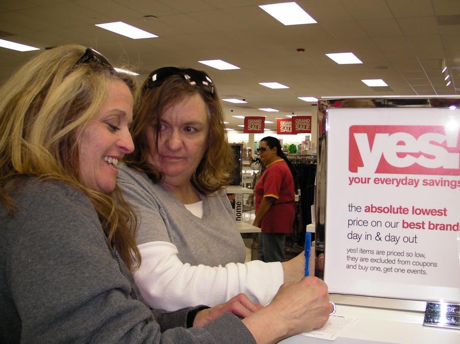 Tracee Naki and Teresa Dyke of Carson City sign up for a shopping spree.