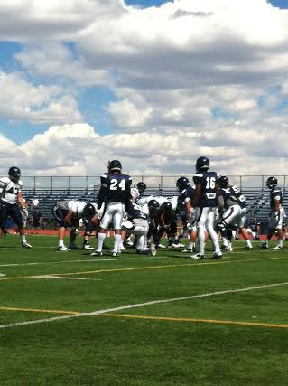 The offense hustling to the line