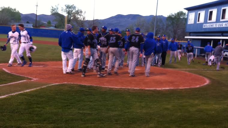 McQueen and Carson shaking hands after the game.