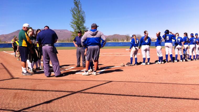 The pregame meeting between the coaches and the umpires