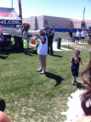 Head Coach Brian Polian addressing the crowd