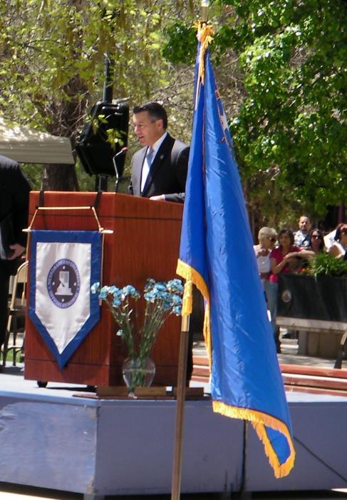 Nevada Gov. Brian Sandoval addresses Thursday's memorial in Carson City.