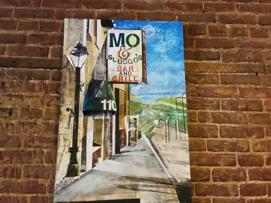 Art work by Pam Black is featured inside the Downtown Pub and Grille. Photo by Dana Lee Fruend
