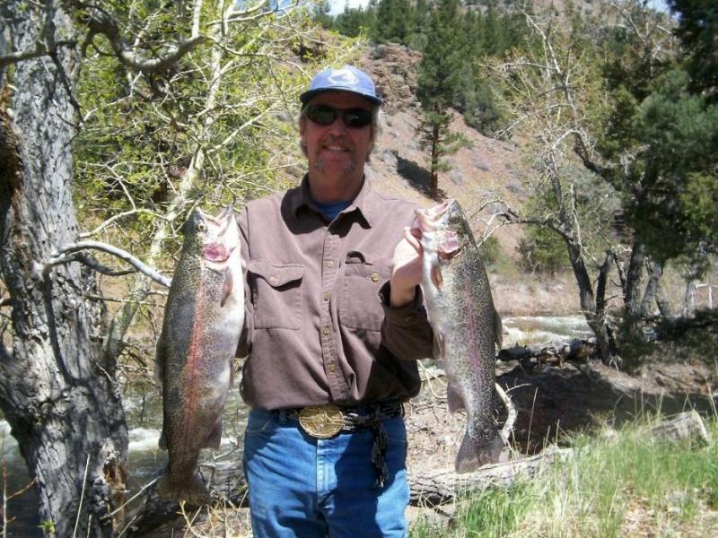 Doug Busey of Douglas County with two rainbow trout caught in the East Carson River, California.
