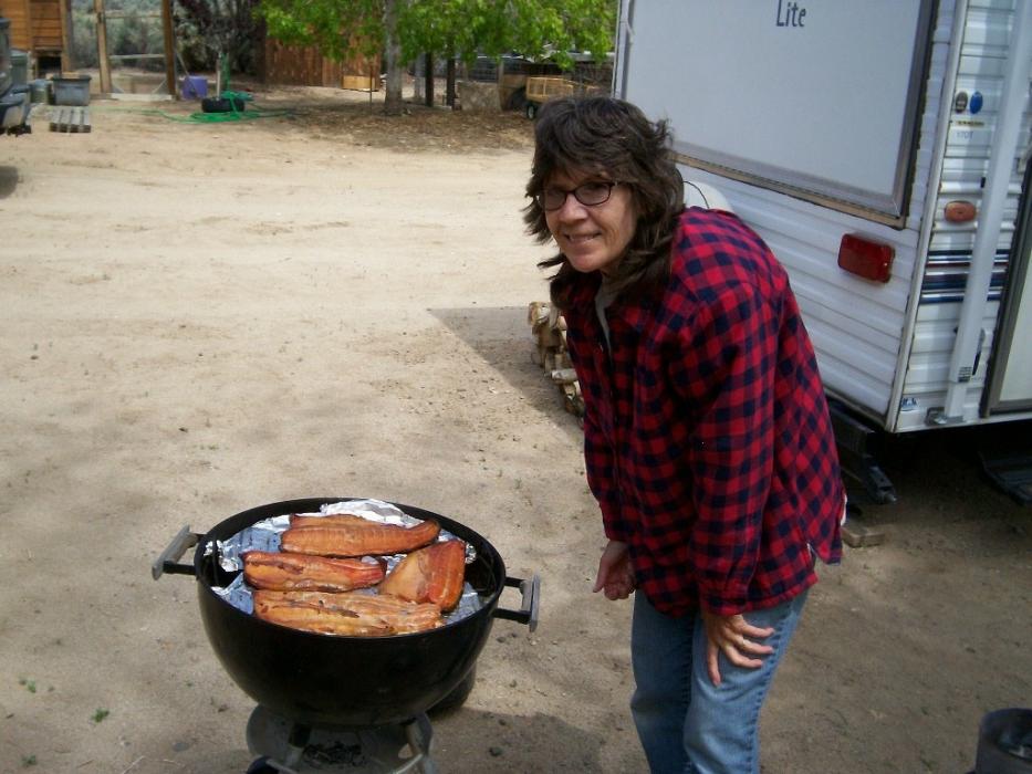 Renee Heinichen of Douglas County cooking the catch.  Photo courtesy of Doug Busey