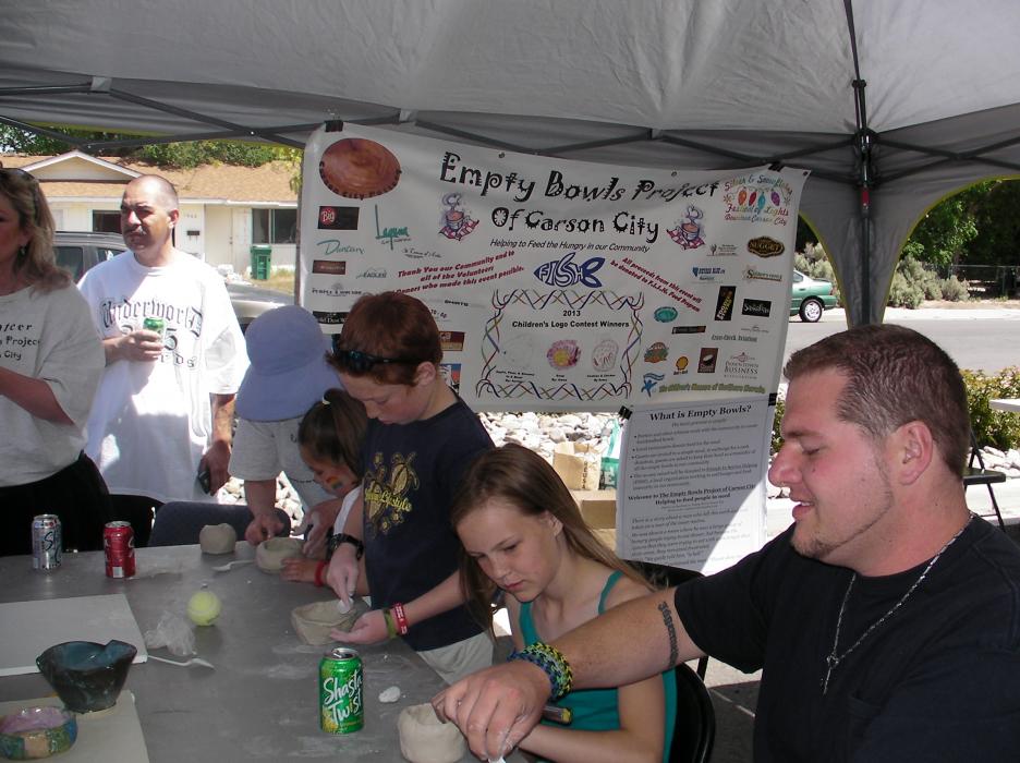 Clay bowl making was the order of the day at the Empty Bowls booth during the Cops and Kids event in Carson City.