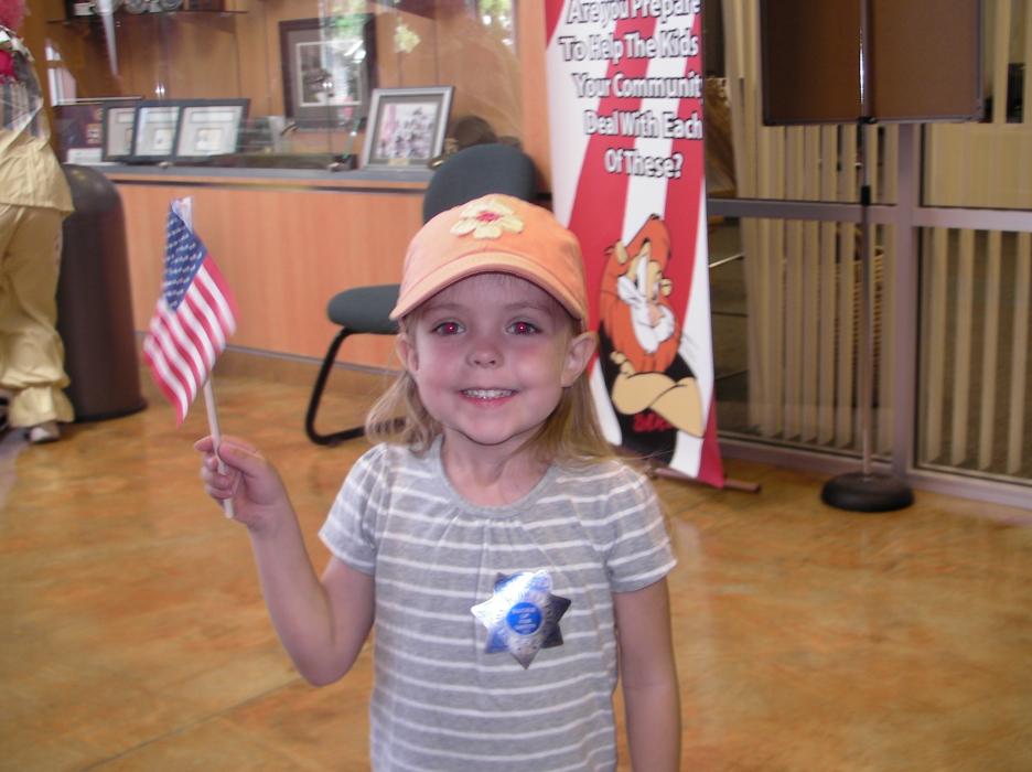 Four year-old Sydney Larsen shows her patriotism.