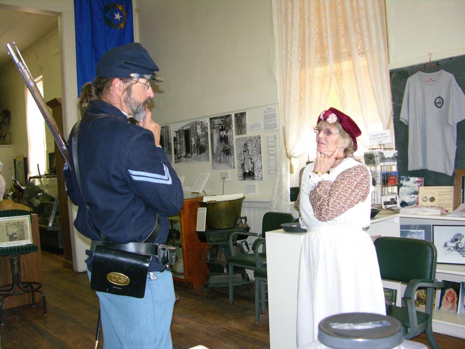 Docent Laura Tennant greeted folks to the schoolhouse.