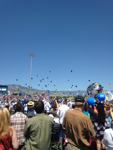 The traditional throwing of graduation caps after the ceremonies