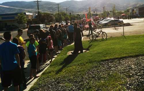 Eager customers lined up around the block up to the Salvation Army while waiting for McDonalds to open its doors.