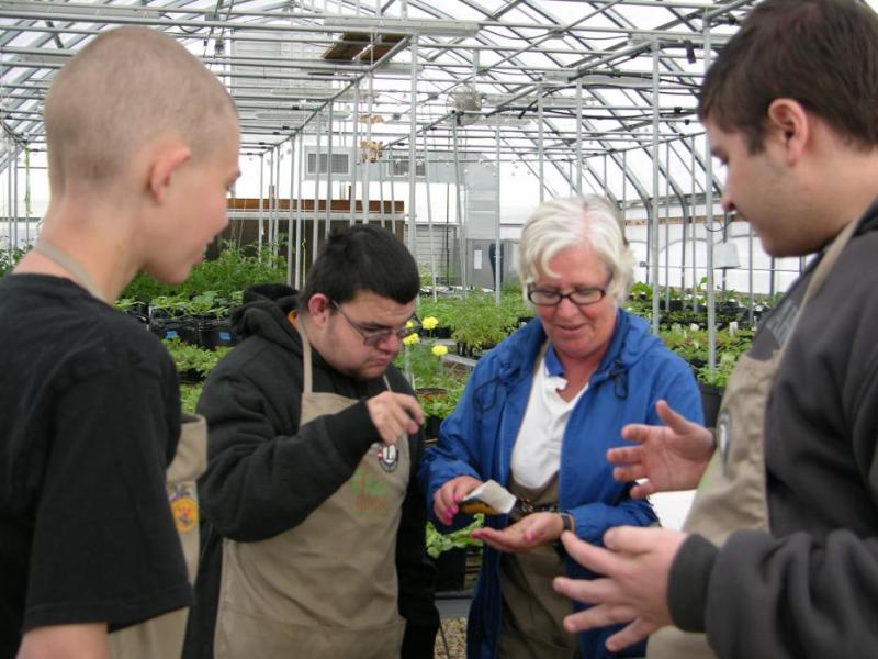 From left, James, Joe and Jacob with teacher Mary Hammerstaedt.