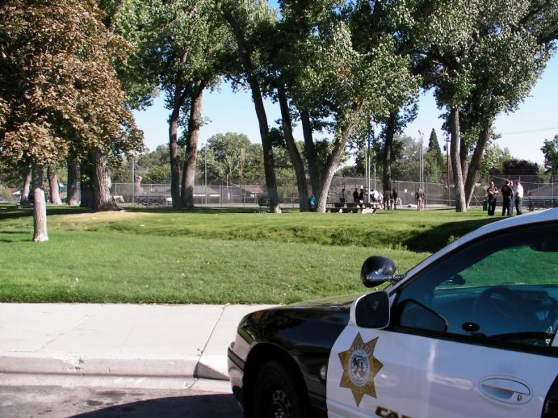 Carson City sheriff's officers at Mills Park where the body of a woman was discovered.