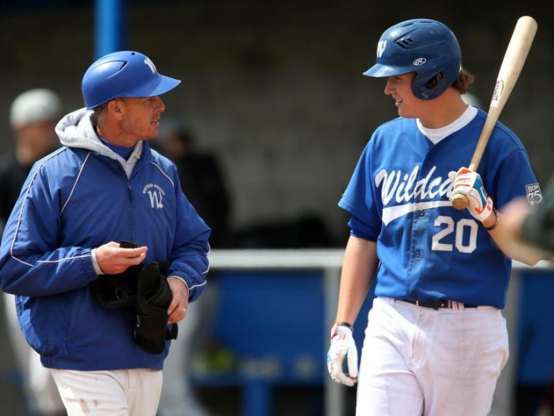 McQueen HS Grad Kody Reynolds and Head Coach DJ Whittemore.