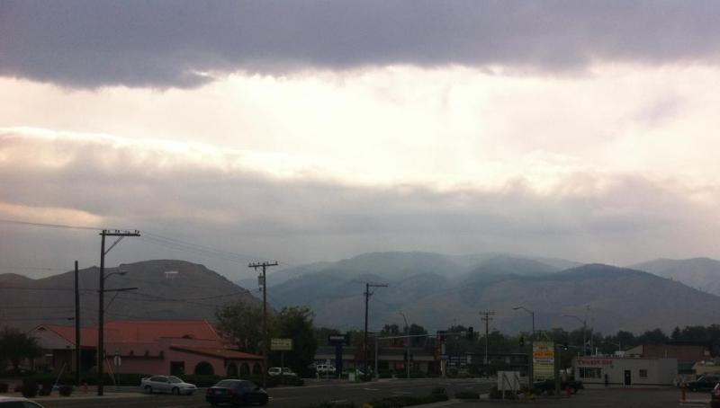 High layers of clouds and smoke from the King Fire push through Carson City on Sunday.