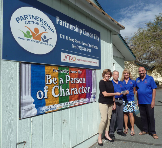 Kathy Bartosz, PCC, receiving a check from Elks Lodge for CC!