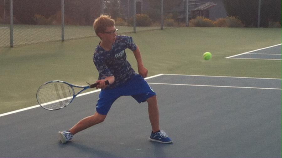 Adams after making contact with a forehand