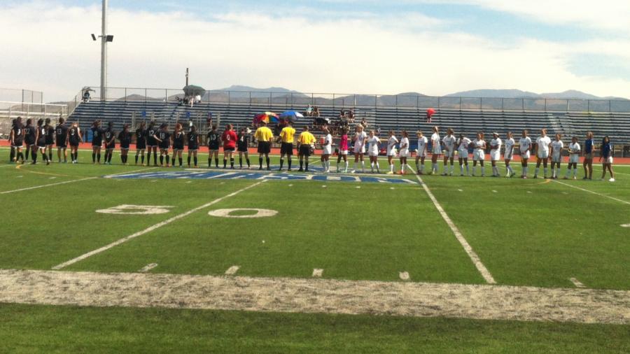 The teams lining up for the match