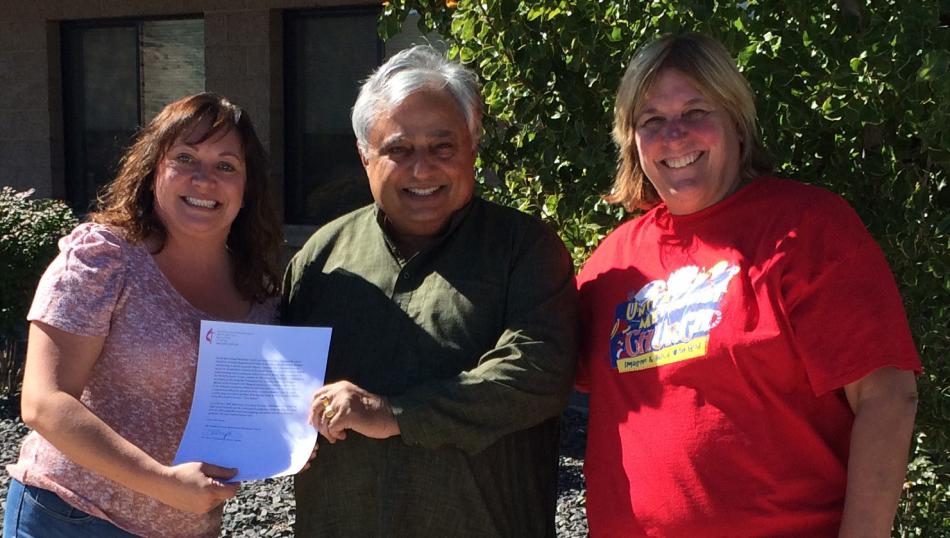 Left to right are Dawn Pidlypchak, Rajan Zed and Pastor Becky Stockdale.