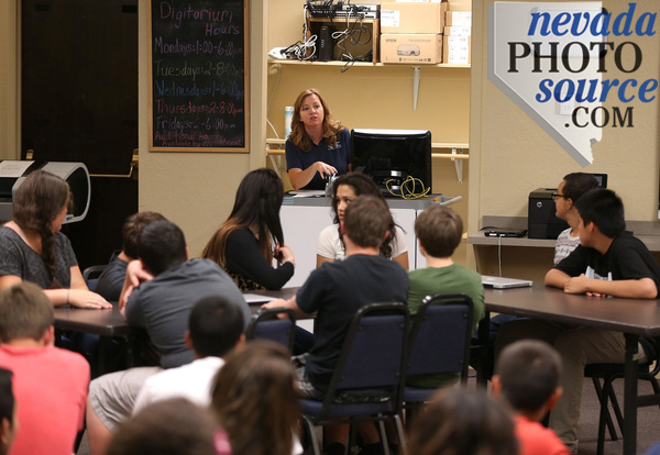 Library Out-of-School-Time-Coordinator, Molly Walt, teaches a group of Carson High School students at the library.