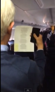 Ken Beaton leads the song on the Southwest Airlines flight.