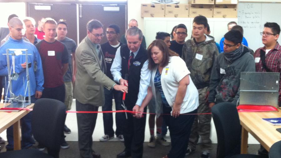 Mayor Bob Crowell cutting the ribbon to open the lab