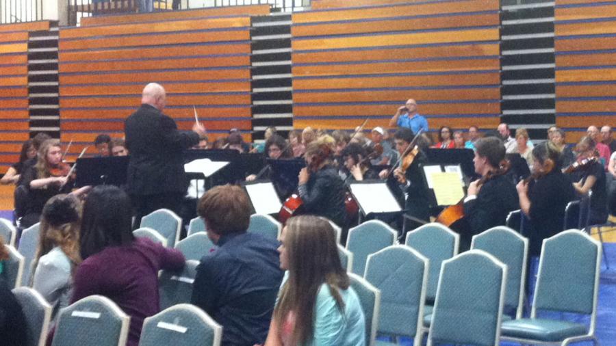 The CHS orchestra giving their performance.