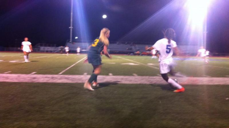 Carson's Isabella Wakeling tracking a ball down.
