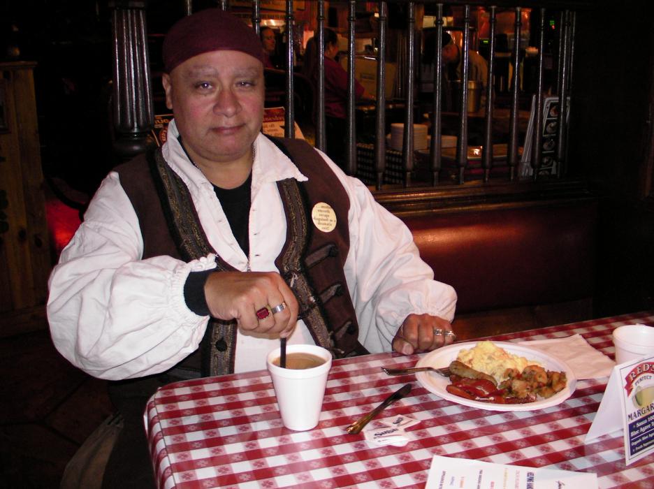 Gerard Reyes, representing Pirates of Reno enjoys his coffee.