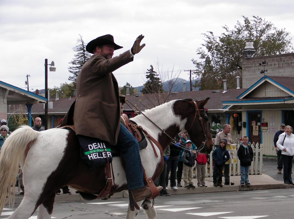 Nevada Sen. Dean Heller rides a horse along the route.