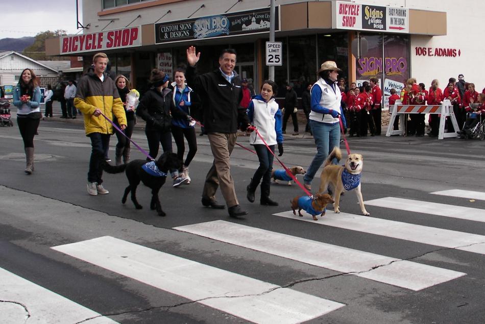 Nevada Gov. Brian Sandoval walks the parade route Saturday morning.